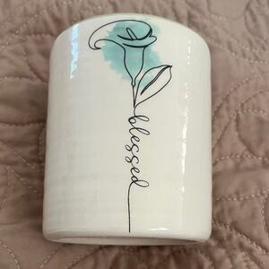White Ceramic Vase with turq. Accent where a black outline of a rose/ “Blessed”!